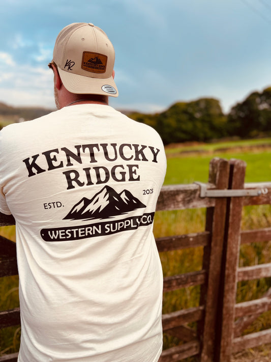 Person wearing a 'Kentucky Ridge' t-shirt with a scenic background
